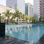 Comfy Studio Tamansari Semanggi Apartment By Travelio