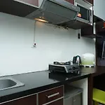 Comfy Studio Tamansari Semanggi Apartment By Travelio